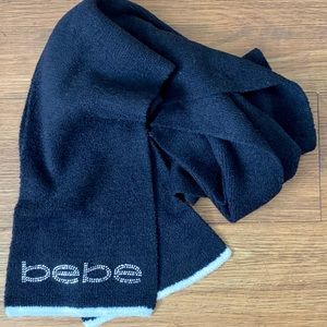 BEBE Knit Winter Scarf Black with sparkle logo.